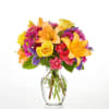 Vase arrangement with Lilys, roses, Daisy poms, Alstromeria and statice with lush