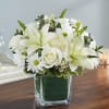 Vase arrangement of Lilys, Mums, Daisy Poms, Roses, Monte Casino, Snapdragons, Eucalyptus