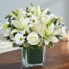 Vase arrangement of Lilys, Mums, Daisy Poms, Roses, Monte Casino, Snapdragons, Eucalyptus