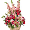 Table top basket design with lilies, roses, snaps and fillers.

Copyrighted content provided