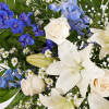 Celebrate the cherished memories you shared with a beautiful floral arrangement. The