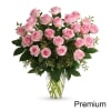 Say it sweeter with this feminine bouquet of pink roses and lush