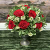 Red Roses, Waxflower, and Mixed Greenry Arrive in a Metal Compote. 
