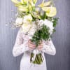 &ldquo;Glowing Grace&rdquo; is the perfect name for this radiant bouquet, reflecting its