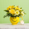 Yellow Roses ,Daisys,Solidago and accent Flowers arranged in A Smile Face Mug