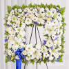 Offer solace with a sentimental arrangement for the services. The square wreath