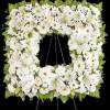 Offer solace with a sentimental arrangement for the services. The square wreath