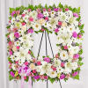 Offer solace with a sentimental arrangement for the services. The square wreath