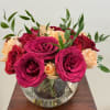 A lovely bowl of colorful roses brightens and lifts any room (and