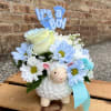 This adorable ceramic lamb is filled with daisies, a rose, filler flowers