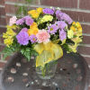 Designed by one of our local girls, this soft arrangement reminds us