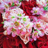 This isn&rsquo;t just a bouquet&mdash;it&rsquo;s a statement piece. Deep red roses wrapped