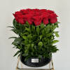 Present your loved one with this captivating red rose vase arrangement. Rising