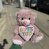 A cute love you mauve teddy bear added to your collection. Our