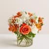 Convey your sincere condolences our elegant bouquet. Loosely gathered mix of warm