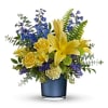 Let the sunshine in! Blooming with gorgeous golden lilies and whimsical blue