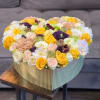 Mixed flowers in a heart box. On the picture Premium size
