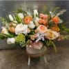 Fresh citrus arrangement blended with white high-end flowers