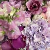 A lush, artful and sophisticated mix of high-end seasonal flowers in pink