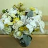 An elegant, sophisticated array of high quality blooms (including but not limited