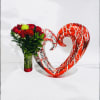 Express your love with our stunning arrangement of 12 vibrant red roses