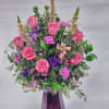 Select this perfectly girly pink and purple arrangement. 