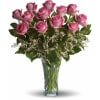 12 Premium long stem pink roses artfully arranged in a recycled clear