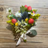 Wildflower mixture with seasonal flowers. Please specify ribbon color.