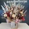This beautiful dried floral creation is perfect as a gift or home
