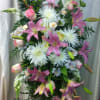 Pink flowers in a standing spray