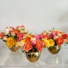 Instant cocktail party florals! Line them up on a long table, or
