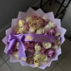 A whisper of dreams unfolds in this enchanting bouquet. Soft purple and