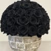 Delight in the charm of up to 60 eternal black roses in