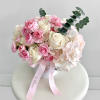 The &quot;Blushing Rose Harmony Box&quot; is a delightful floral arrangement that exudes