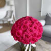 A breathtaking symbol of passion and devotion, this arrangement features 100 luxurious