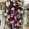 Standing tall, proud and patriotic, this dazzling free-standing spray is like a
