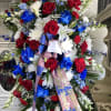 Standing tall, proud and patriotic, this dazzling free-standing spray is like a