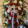 Standing tall, proud and patriotic, this dazzling free-standing spray is like a