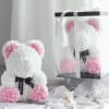 Meet our adorable White Rose Bear, a cuddly companion infused with the