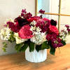 Elegant Emily is a colorful mix of roses, ranunculus, stock and hydrangea