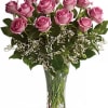 A charming bouquet of a dozen fresh and fragrant roses, adorned with