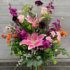 Beautiful seasonal fresh arrangement fille dwith what is in season and including