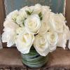 Make a bold statement with this elegantly simple design. White roses symbolize
