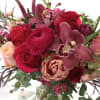 Hot pink roses with orchids and ranunculus. As Paris once said &quot;that&#039;s
