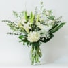 A beautiful and large white arrangement, perfect for House-warming, wedding present or