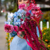 An exquisite fusion of bold and delicate hues, Royal Bloom is a