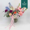 This gorgeous arrangement is a beautiful mix of colors and flowers for