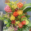The Arrangement reflects the Premium Bouquet made in vase with foam (we
