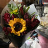 Bouquets   of roses and sunflowers  