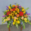 Sunlit Memories Casket is a vibrant display combines bright shades with stunning